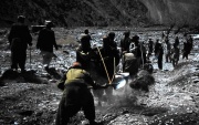 Communal maintenance of a diversion dam in a stony river bed, Balochistan, Pakistan